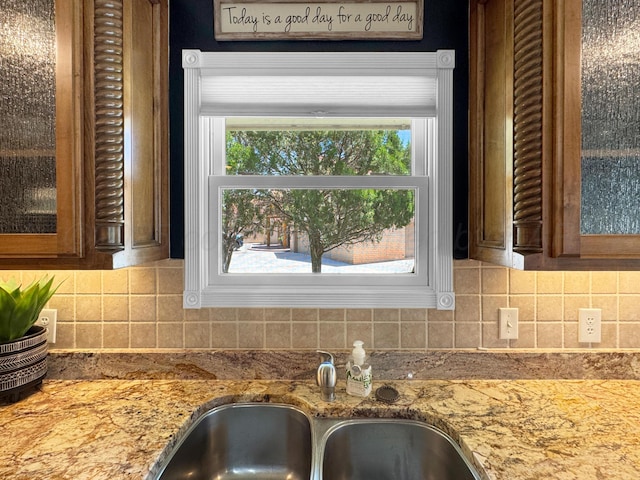 120 Port O Call Dr, Amarillo, TX 79118 - kitchen view of glass insert cabinets, light stone counters, and tasteful backsplash