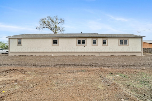 517 Whittier St, Hereford, TX 79045 - back of house featuring stucco siding