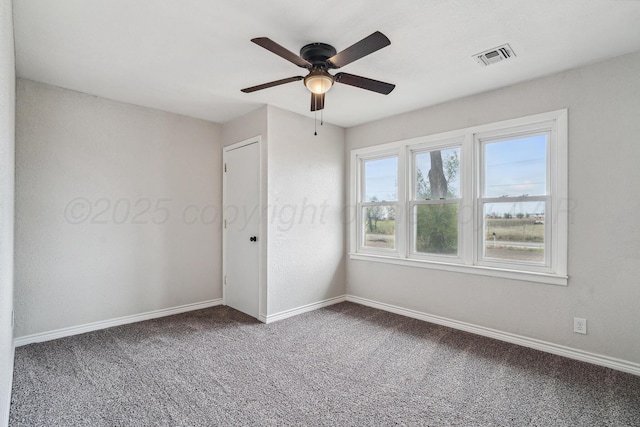 517 Whittier St, Hereford, TX 79045 - empty room featuring carpet and a ceiling fan