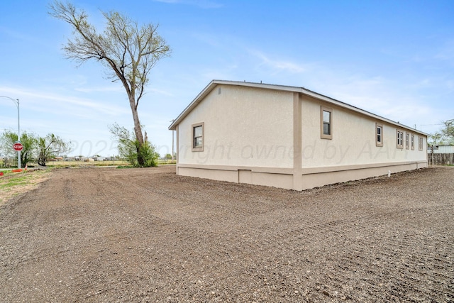 517 Whittier St, Hereford, TX 79045 - view of home's exterior featuring stucco siding