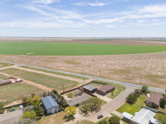 birds eye view of property featuring a rural view