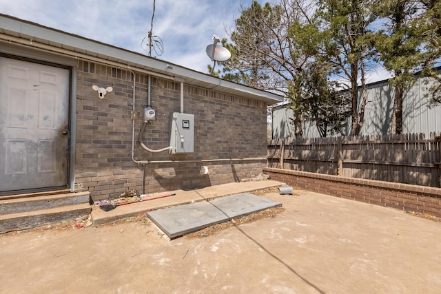 exterior space with fence and entry steps