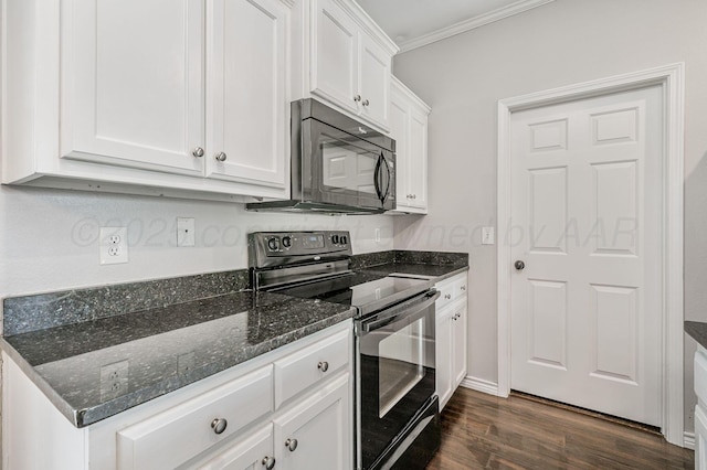 kitchen with dark stone counters, white cabinetry, dark wood-type flooring, ornamental molding, and black appliances