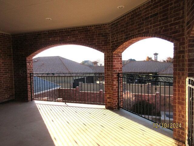 view of patio / terrace featuring a balcony