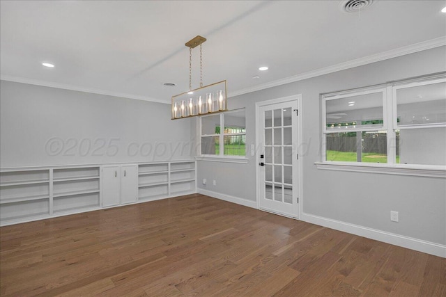 4400 Gem Lake Rd, Amarillo, TX 79106 - unfurnished dining area featuring wood finished floors, ornamental molding, recessed lighting, and a chandelier