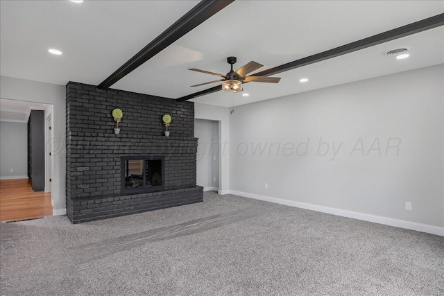 4400 Gem Lake Rd, Amarillo, TX 79106 - unfurnished living room with carpet, ceiling fan, a fireplace, and recessed lighting