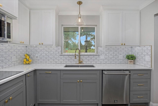 4400 Gem Lake Rd, Amarillo, TX 79106 - kitchen featuring stainless steel appliances, gray cabinetry, decorative backsplash, white cabinets, and crown molding