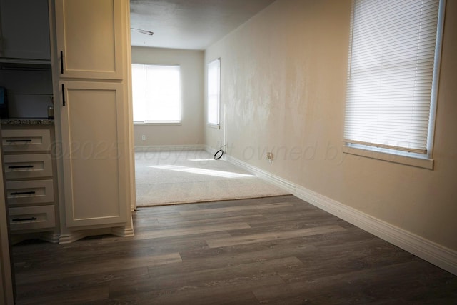 hall featuring dark hardwood / wood-style flooring