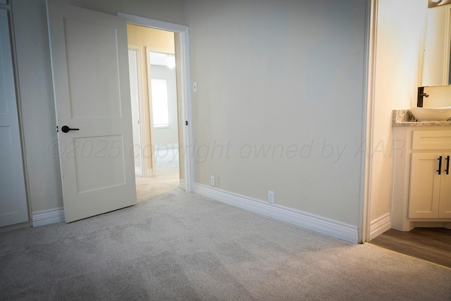 bedroom featuring light colored carpet