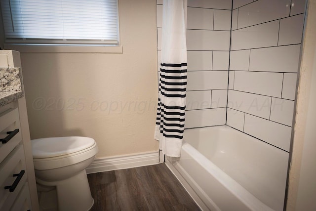 full bathroom with vanity, hardwood / wood-style floors, shower / bath combination with curtain, and toilet