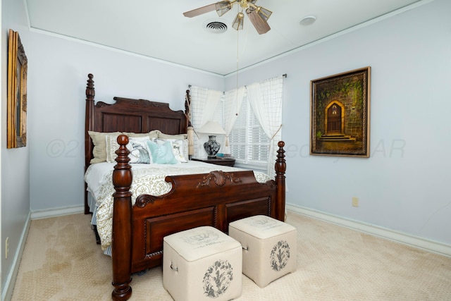 bedroom featuring light carpet, baseboards, and ceiling fan