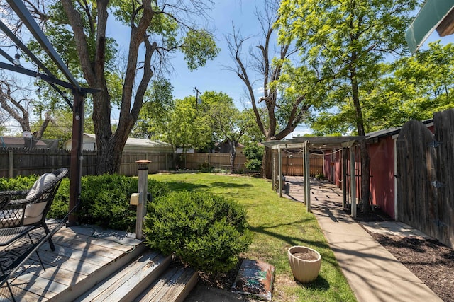 view of yard featuring a wooden deck