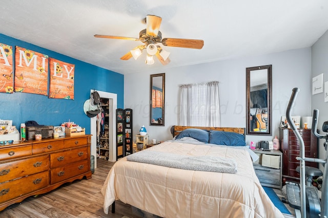 3616 NE 21st Ave, Amarillo, TX 79107 - bedroom featuring wood finished floors and a ceiling fan