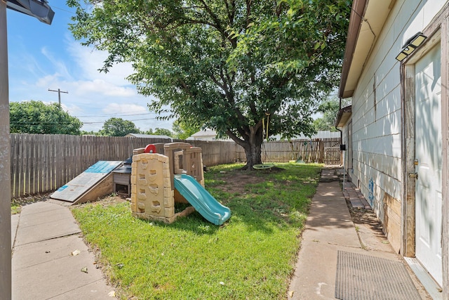 3616 NE 21st Ave, Amarillo, TX 79107 - fenced backyard with a playground