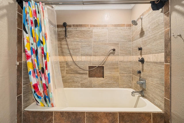 3616 NE 21st Ave, Amarillo, TX 79107 - bathroom with tiled shower / bath and ornamental molding