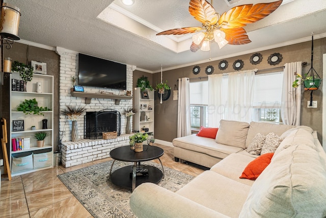 3616 NE 21st Ave, Amarillo, TX 79107 - living room featuring ornamental molding, ceiling fan, a fireplace, and a textured ceiling