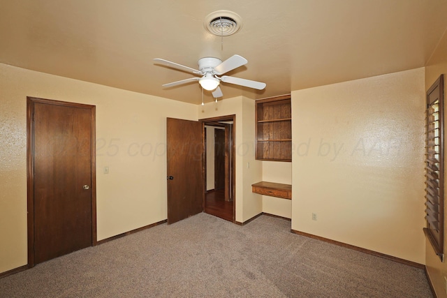 4410 Chandler Dr, Amarillo, TX 79109 - unfurnished bedroom featuring carpet floors, baseboards, and ceiling fan