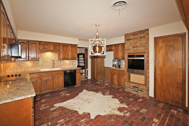 4410 Chandler Dr, Amarillo, TX 79109 - kitchen featuring black appliances, a sink, brick flooring, and tasteful backsplash