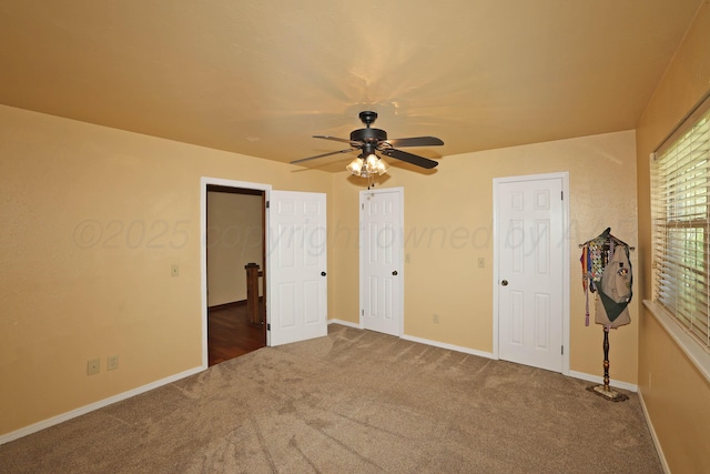 4410 Chandler Dr, Amarillo, TX 79109 - unfurnished bedroom with carpet, baseboards, and ceiling fan