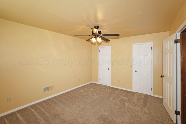 4410 Chandler Dr, Amarillo, TX 79109 - unfurnished bedroom with carpet, baseboards, and a ceiling fan