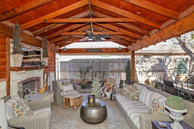 4410 Chandler Dr, Amarillo, TX 79109 - view of patio featuring an outdoor living space with a fireplace, ceiling fan, and a gazebo