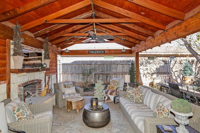 4410 Chandler Dr, Amarillo, TX 79109 - view of patio / terrace with an outdoor living space with a fireplace, a ceiling fan, and a gazebo
