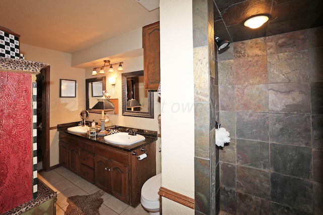 4410 Chandler Dr, Amarillo, TX 79109 - full bath with a walk in shower, double vanity, and tile patterned floors