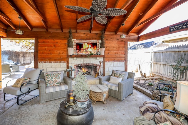 4410 Chandler Dr, Amarillo, TX 79109 - view of patio / terrace featuring ceiling fan and an outdoor living space with a fireplace