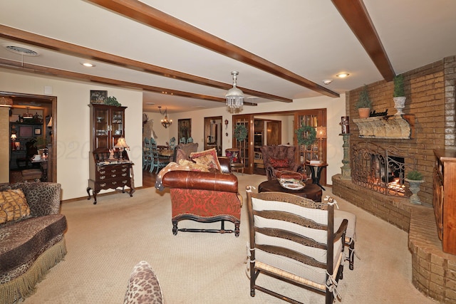 4410 Chandler Dr, Amarillo, TX 79109 - carpeted living room with beam ceiling, a fireplace, and baseboards