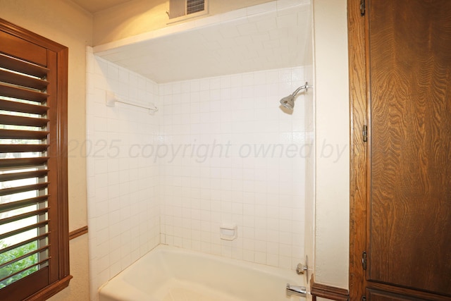 4410 Chandler Dr, Amarillo, TX 79109 - bathroom featuring washtub / shower combination, healthy amount of natural light, and radiator heating unit