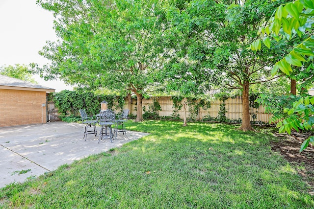 4410 Chandler Dr, Amarillo, TX 79109 - fenced backyard with a patio area