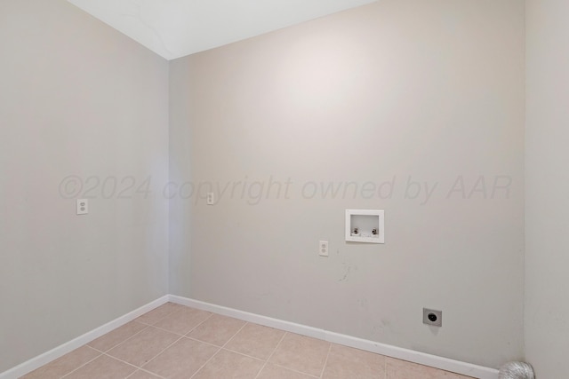 13701 Cedarwood Dr, Amarillo, TX 79118 - laundry area featuring hookup for an electric dryer, washer hookup, baseboards, and light tile patterned floors
