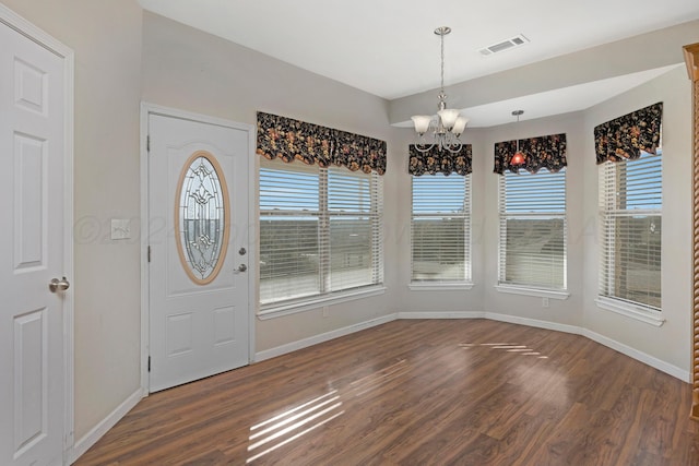 13701 Cedarwood Dr, Amarillo, TX 79118 - foyer with a chandelier, wood finished floors, and baseboards