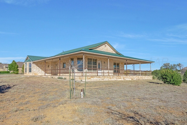 13701 Cedarwood Dr, Amarillo, TX 79118 - farmhouse-style home featuring stone siding and a porch