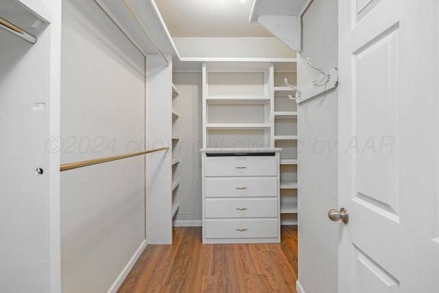13701 Cedarwood Dr, Amarillo, TX 79118 - spacious closet with wood finished floors