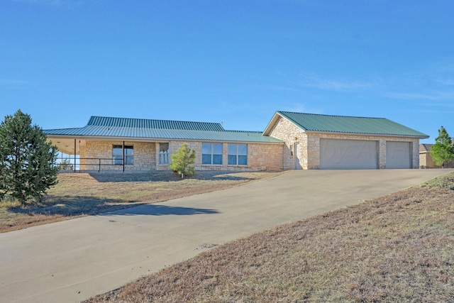 13701 Cedarwood Dr, Amarillo, TX 79118 - single story home featuring metal roof, stone siding, and driveway