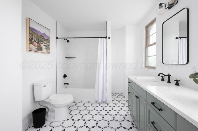 full bathroom featuring shower / bath combination with curtain, toilet, and vanity