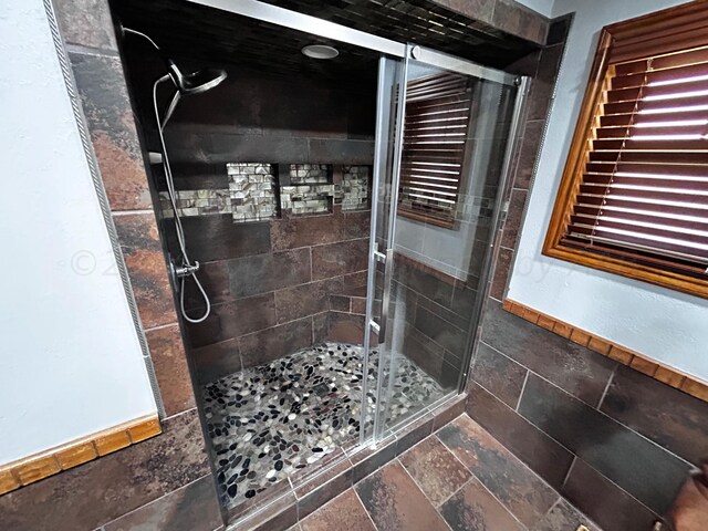 bathroom featuring walk in shower