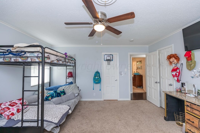 5109 Tawney Ave, Amarillo, TX 79106 - bedroom featuring ornamental molding, carpet floors, a textured ceiling, and ceiling fan
