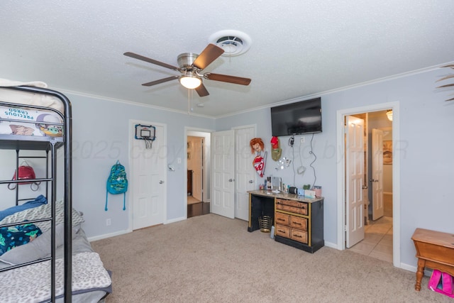 5109 Tawney Ave, Amarillo, TX 79106 - bedroom featuring light colored carpet, ornamental molding, a textured ceiling, a ceiling fan, and connected bathroom