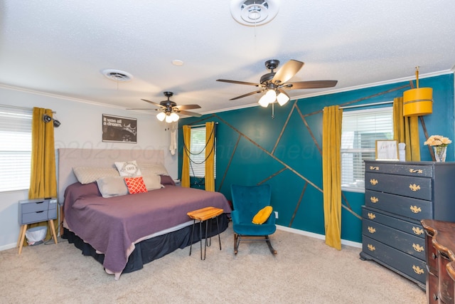 5109 Tawney Ave, Amarillo, TX 79106 - bedroom with crown molding, carpet flooring, a textured ceiling, and ceiling fan