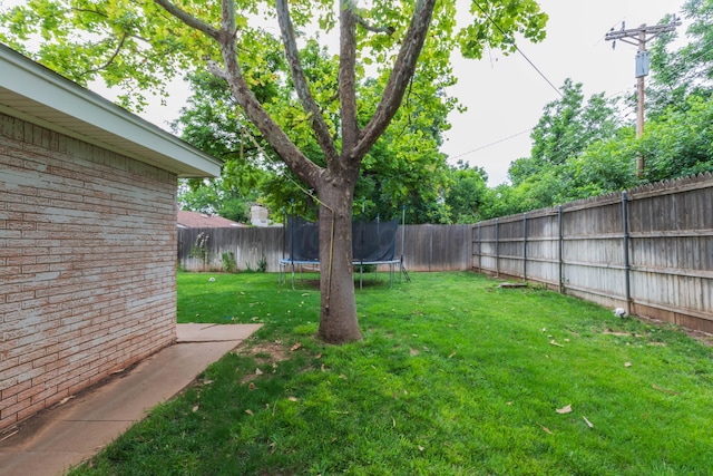 5109 Tawney Ave, Amarillo, TX 79106 - fenced backyard featuring a trampoline