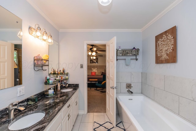 5109 Tawney Ave, Amarillo, TX 79106 - ensuite bathroom featuring tile patterned flooring, a bath, double vanity, crown molding, and a ceiling fan