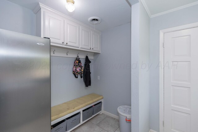 5109 Tawney Ave, Amarillo, TX 79106 - mudroom featuring crown molding and light tile patterned floors