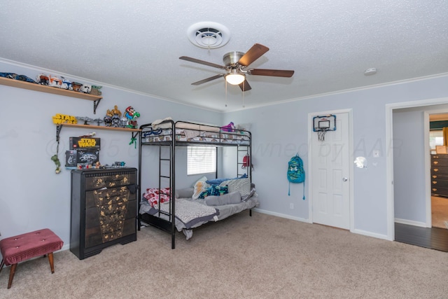 5109 Tawney Ave, Amarillo, TX 79106 - bedroom with crown molding, light carpet, a ceiling fan, and a textured ceiling