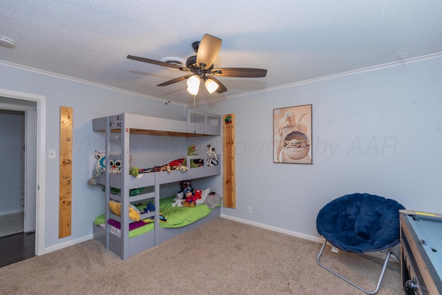 5109 Tawney Ave, Amarillo, TX 79106 - carpeted bedroom featuring ornamental molding, ceiling fan, and a textured ceiling