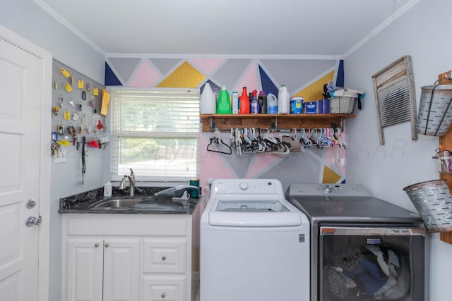 5109 Tawney Ave, Amarillo, TX 79106 - laundry area with ornamental molding, washing machine and clothes dryer, and cabinet space