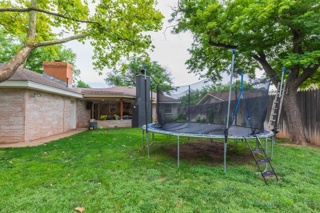 5109 Tawney Ave, Amarillo, TX 79106 - view of yard featuring a trampoline