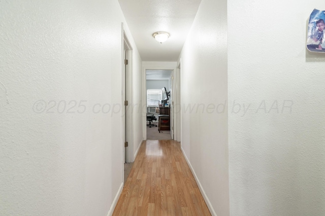1411 N Highland St, Amarillo, TX 79107 - corridor featuring light wood-style flooring and baseboards