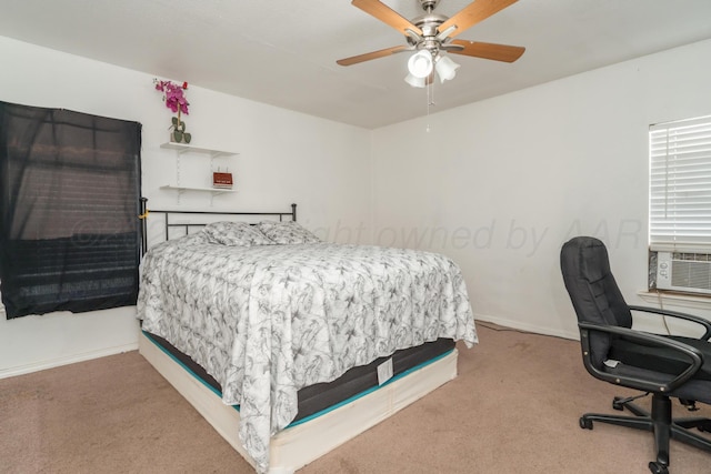 1411 N Highland St, Amarillo, TX 79107 - bedroom with light colored carpet, an office area, baseboards, and a ceiling fan